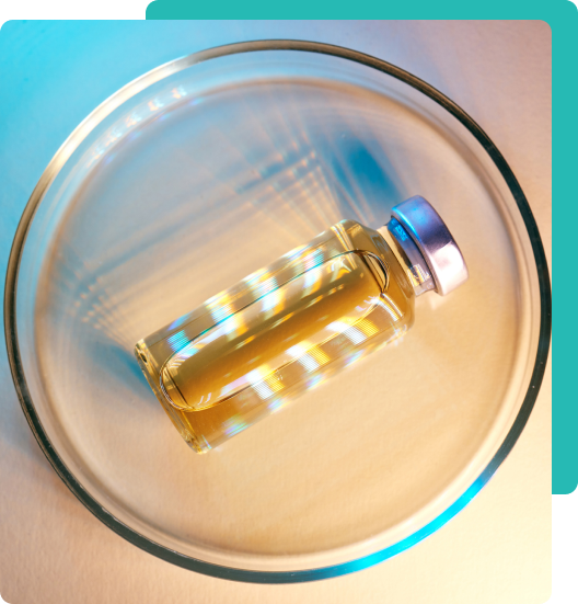 A peptide vial in a petri dish representing verified sourcing at Nexus Wellness House
